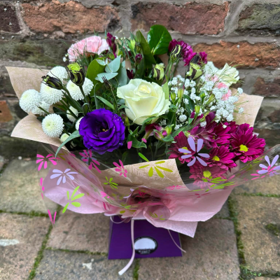 Cool Breeze - This classical stylish collection of flowers, make this hand tied the perfect gift. Flowers professionally arranged and delivered by a local florist.