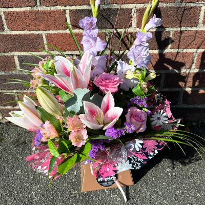 Out of this World - Looking for that ultimate gift that's out of this world!? Look no further. This fabulous hand-tied of the finest and freshest blooms is all you need to make a lasting impression...
