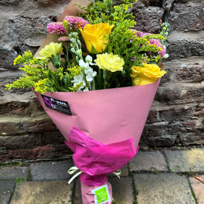 Wrap of Loveliness - A simple wrap of mixed flowers to convey your message will be put together from the finest collection of flowers on the day by a real local florist.